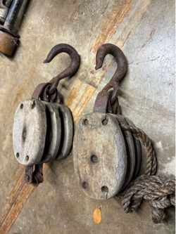 Antique wooden pulley system Antique wooden pulley system