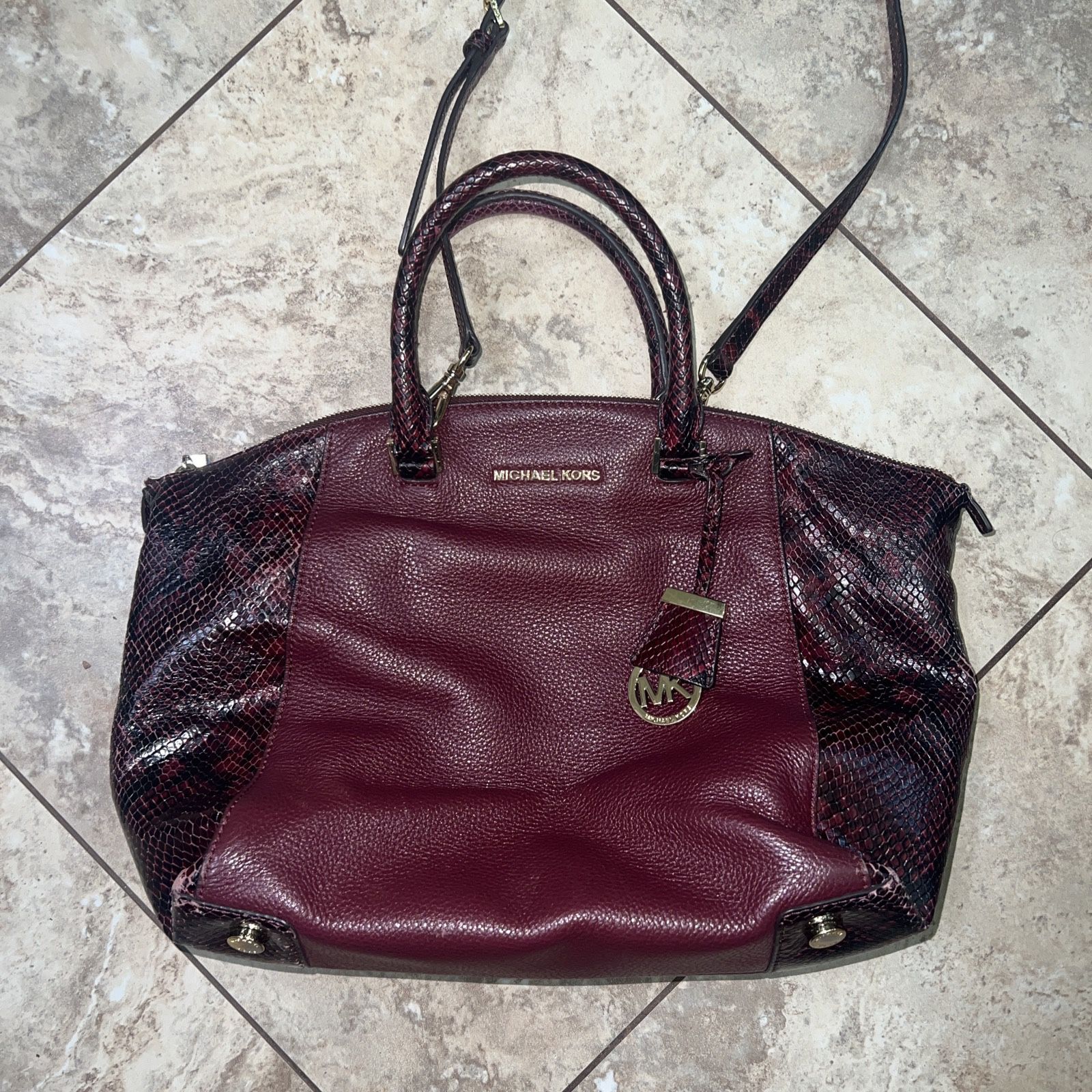 michael kohrs maroon bag