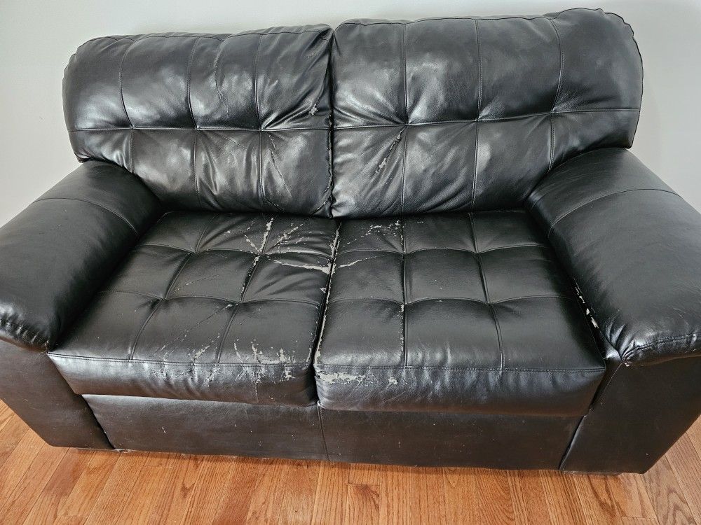 Bob's Discount Furniture Black Leather-Like Love Seat