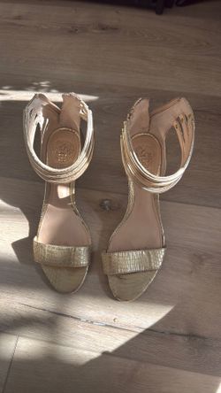 Vince Camuto Misha dress sandals in a gold metallic finish. size 7M /37.
