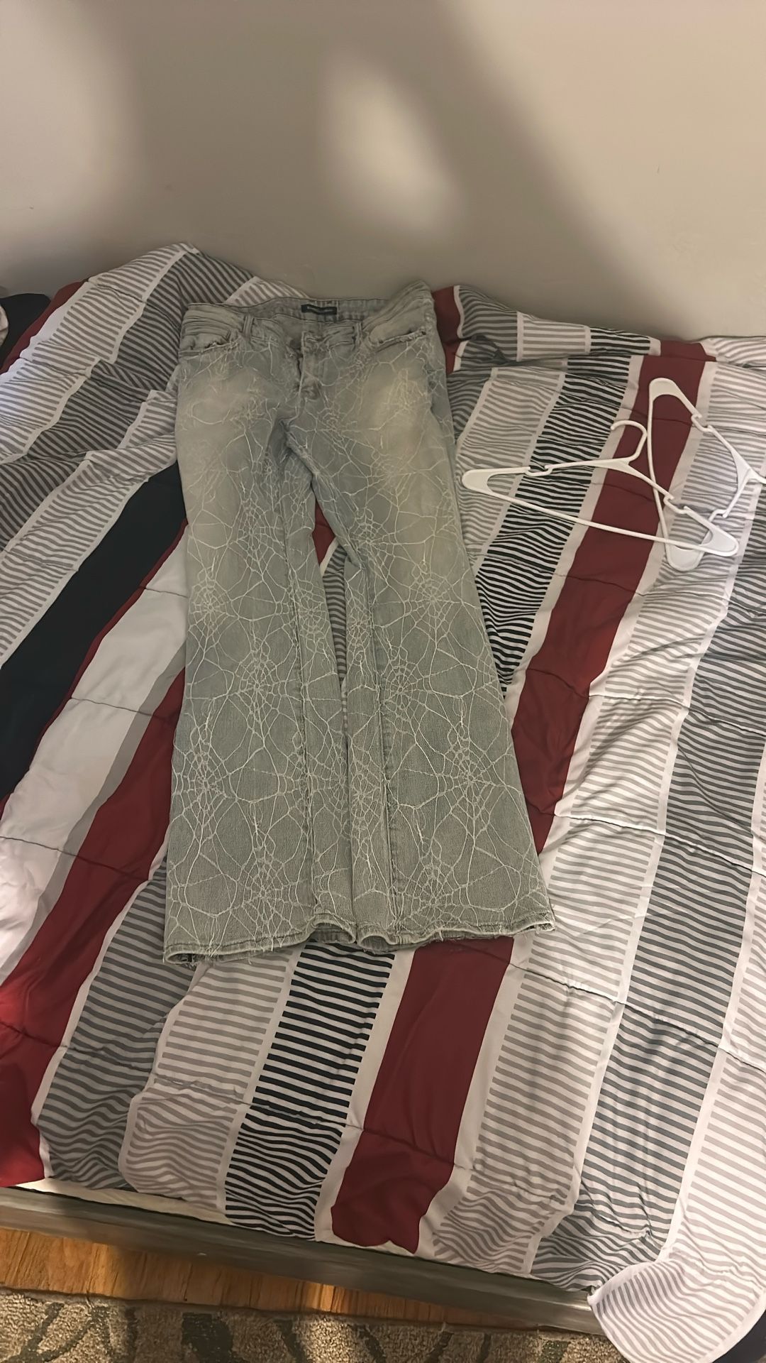 Stacked spiderweb jeans