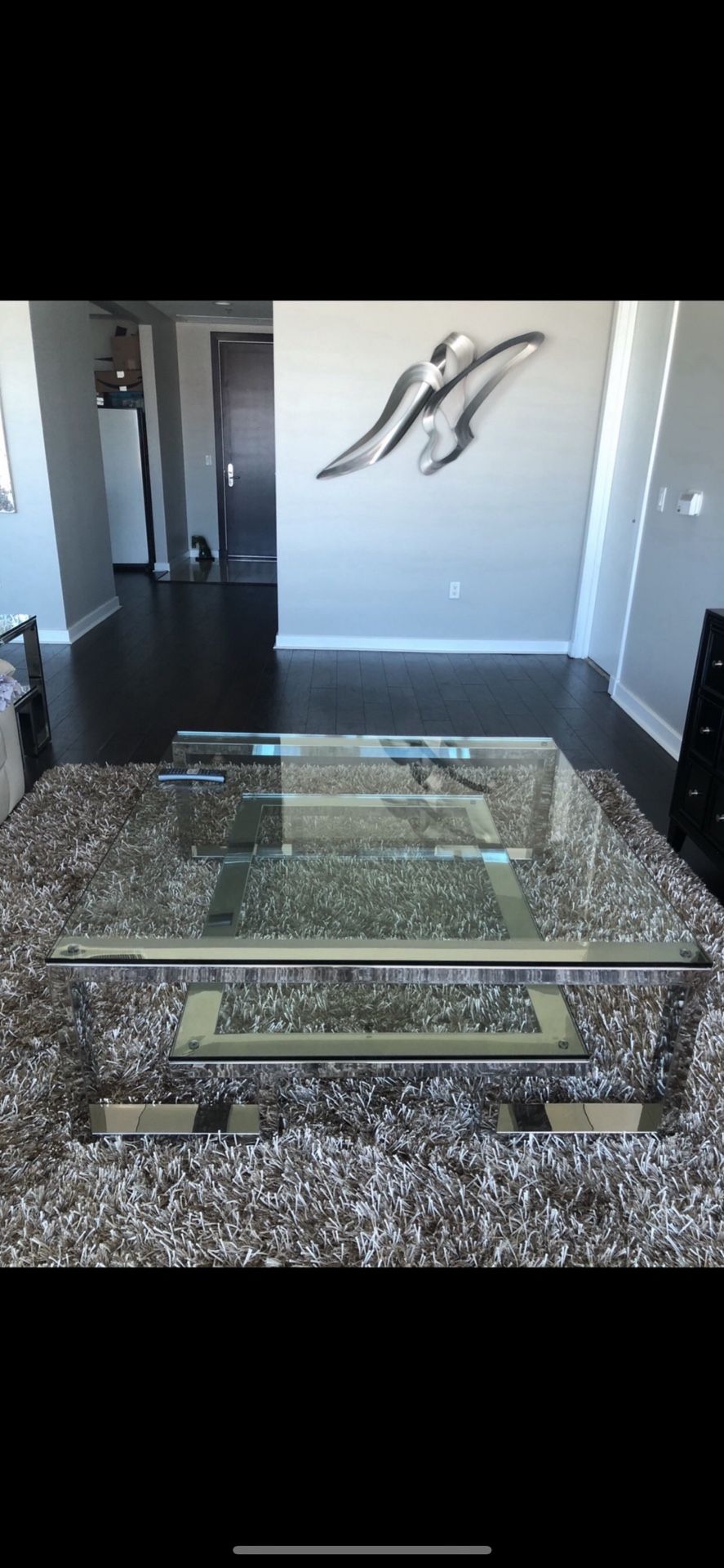 Glass end table 27 Inches By 2 Ft 700.00. Glass cocktail coffee table 50 Inches By 50 inches 1600.