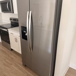 Brand New Whirlpool Fridge Side-by-side refrigerator with external ice/water dispenser