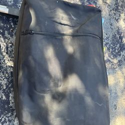 Suitcase filled with fabric