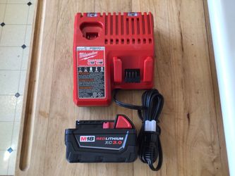Milwaukee M18 Battery And Charger. Brand NEW.   NUEVO.