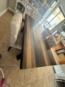 Dinning Table with 4 chairs and the bench