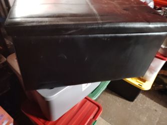 Black leather ottomans