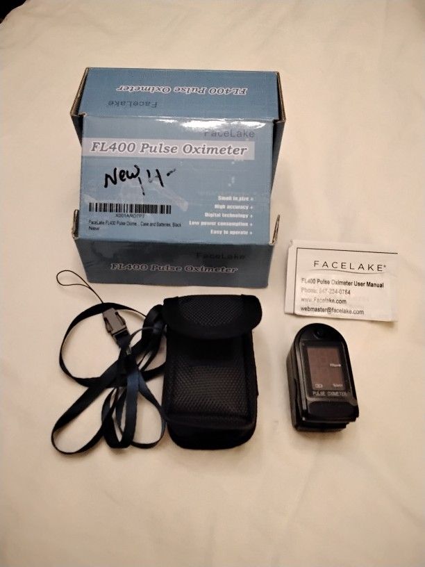NEW FL400 Pulse Oximeter with Neck/Wrist Cord, Carrying Case and Batteries, Black. NEVER USED....asking $14.00