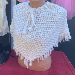 White crocheted girls cape