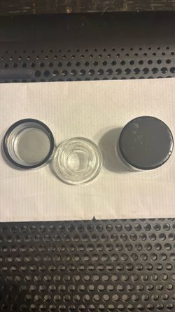 Small glass cosmetic sample  jars with lids