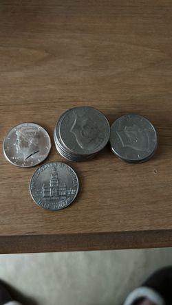 16 Kennedy half dollars