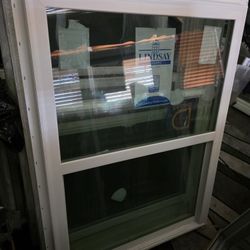 One New construction Vinyl window 35.5x48