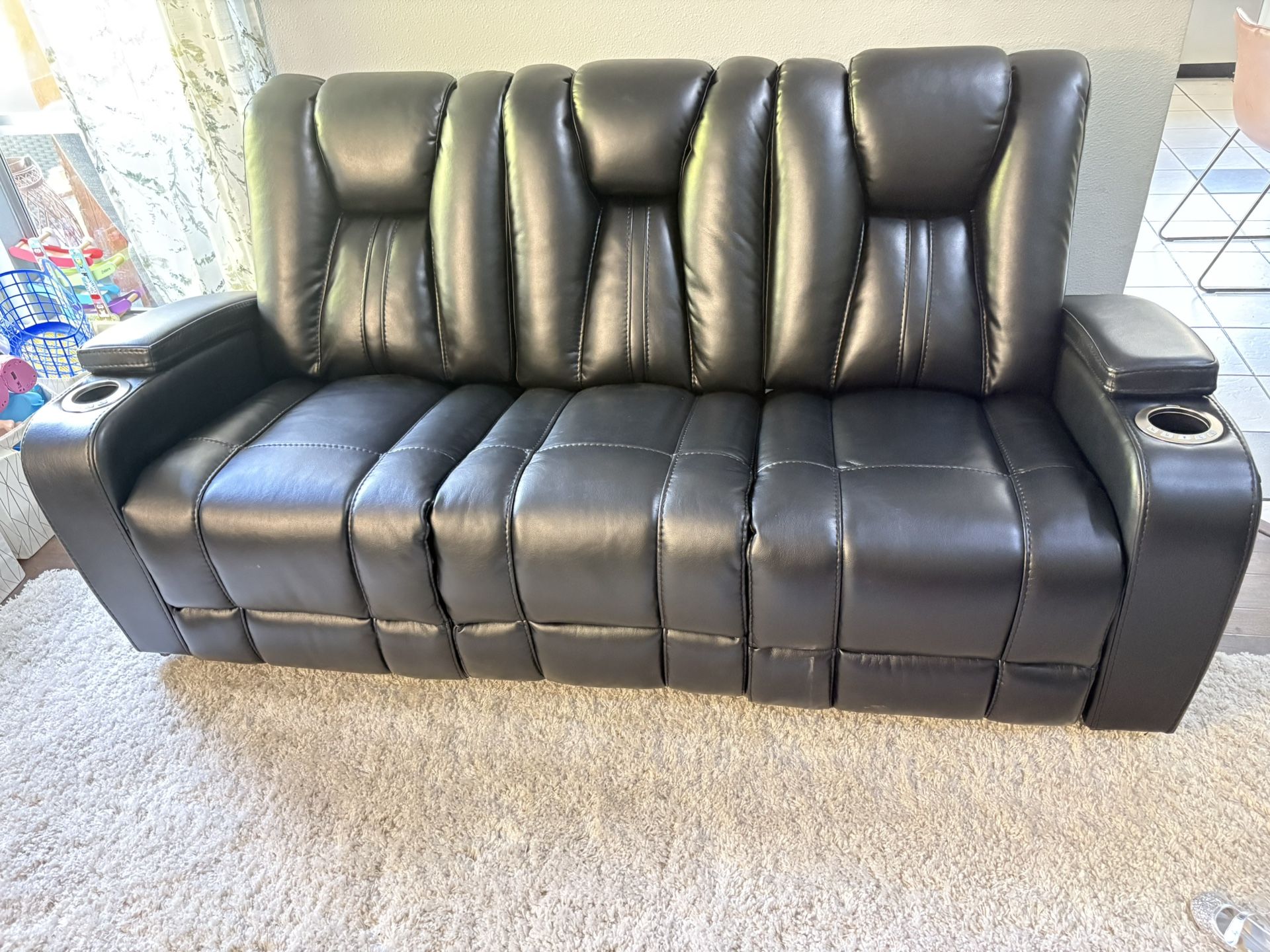 2 Power Black Leather Reclining Sofa (ask For Delivery For A Extra Fee)