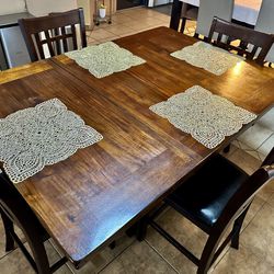 BROWN DINNING TABLE 
