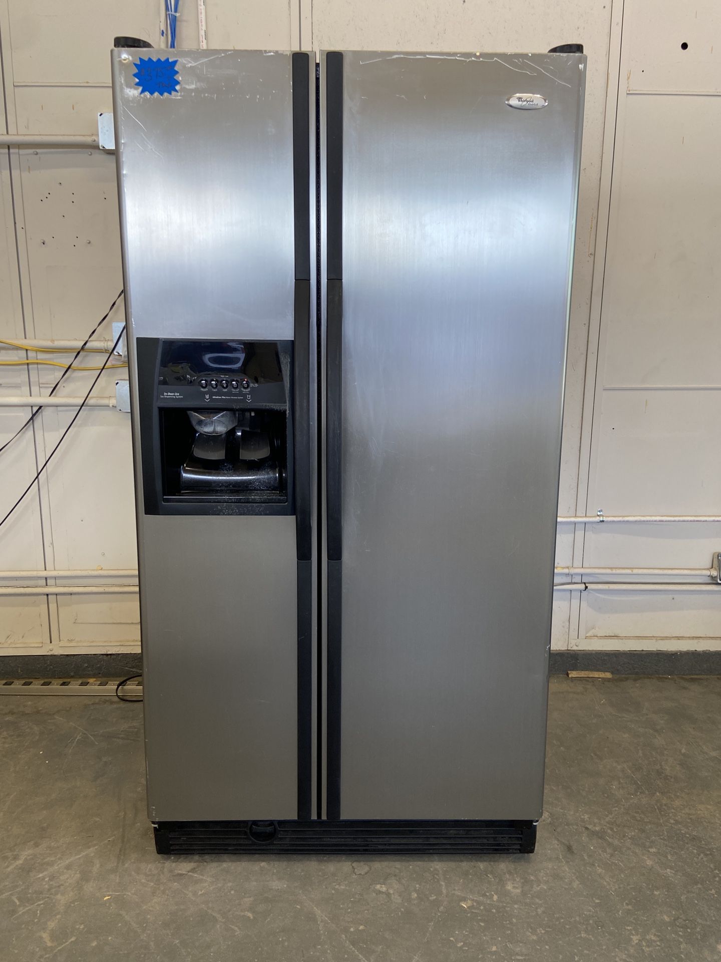 WHIRLPOOL STAINLESS STEEL SIDE BY SIDE REFRIGERATOR