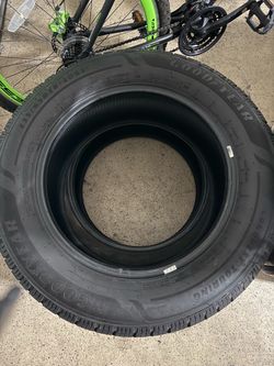 Pair of Goodyear  Conquest Touring Tire 235/65R18