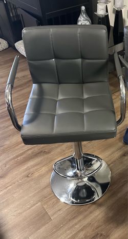 One Gray Swivel Bar Stools