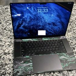 MacBook Pro M3 Max (with FISHSKYN Emerald protective skin)