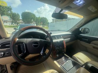 GMC Yukon Denali SUV white