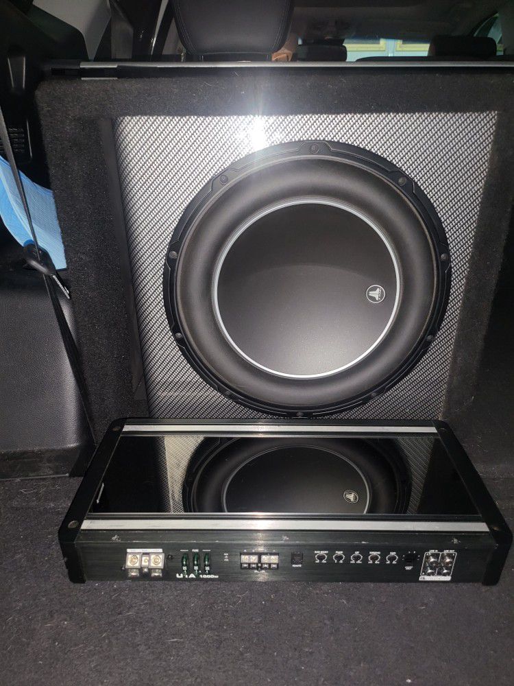 2 12" Subs & 2 Amps 