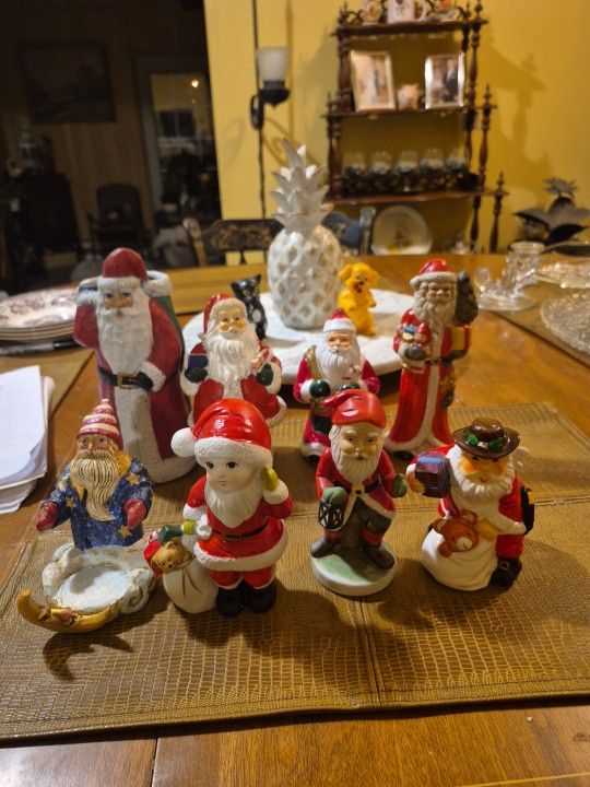 8 Vintage and uniqueSanta's, including three old world