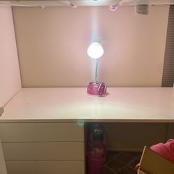 bed with desk and closet