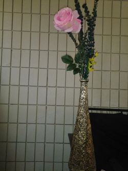 Vase and artificial flowers