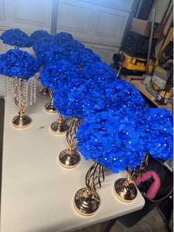 Blue hydrangeas and gold crystal centerpieces
