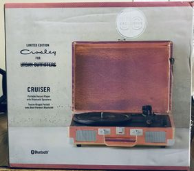 Brand new, unopened, limited edition, Crosley, Bluetooth equipped gorgeous Record Player with a bonus Christmas songs record