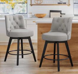 2 Grey Tufted Swivel Bar Stools