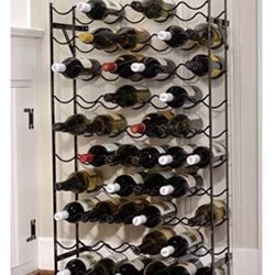 Wine rack can be hung up or placed on the floor brand new in the