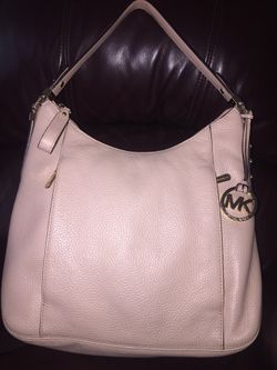 Michael Kors leather mauve purse with gold accents