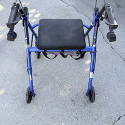 Walker With Seat And Storage