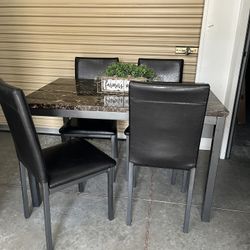 Table And 4 Chairs 