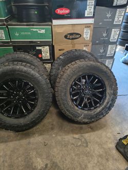 18x9.5+15 New Wheels And 35" Toyo Tires 6x135