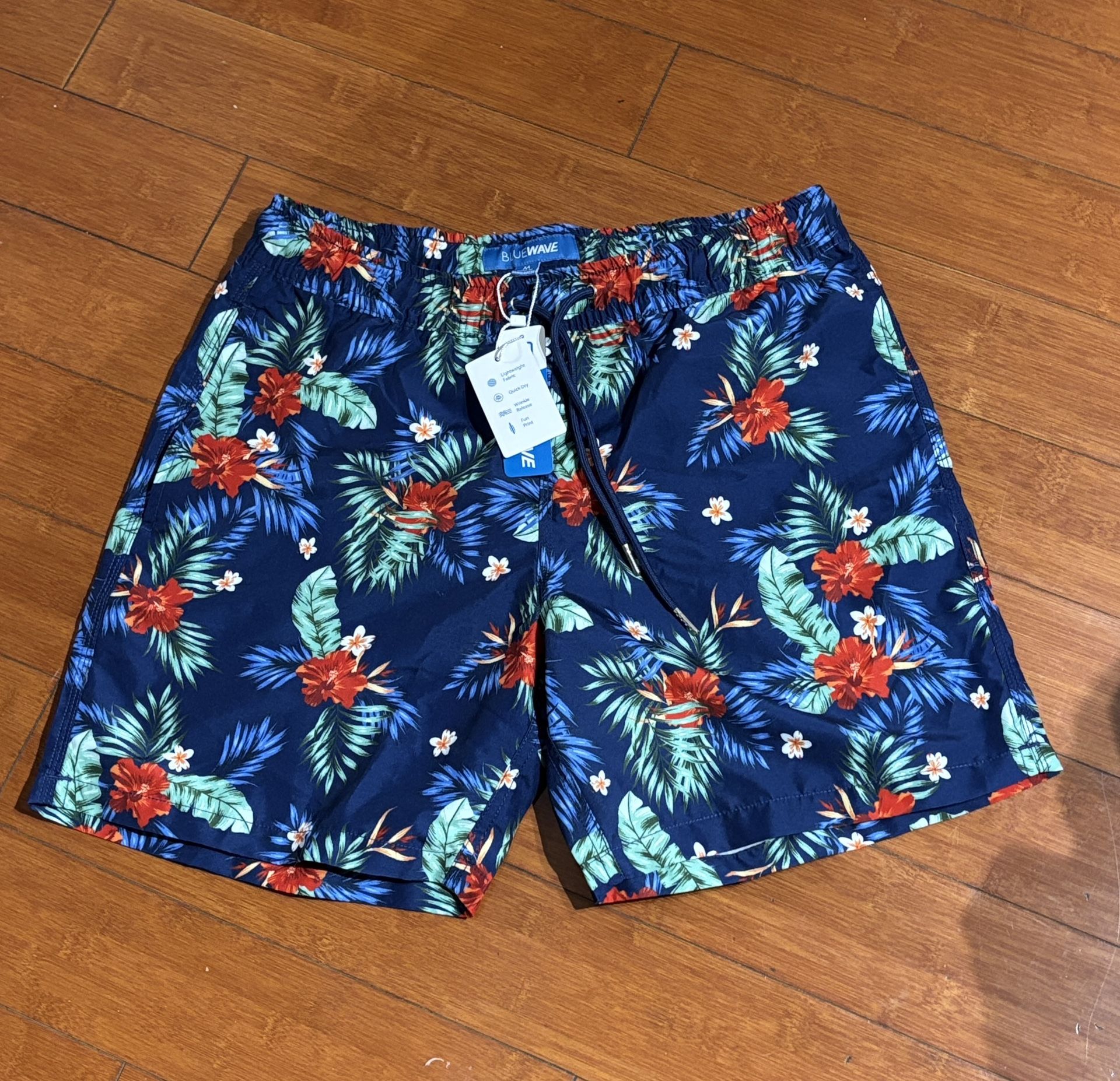 Blue Wave floral swim trunks #swimwear