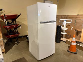 WHIRLPOOL 28-inch wide top-freezer refrigerator with an 18 cu. Ft. Capacity Model #WRT518SZFW00