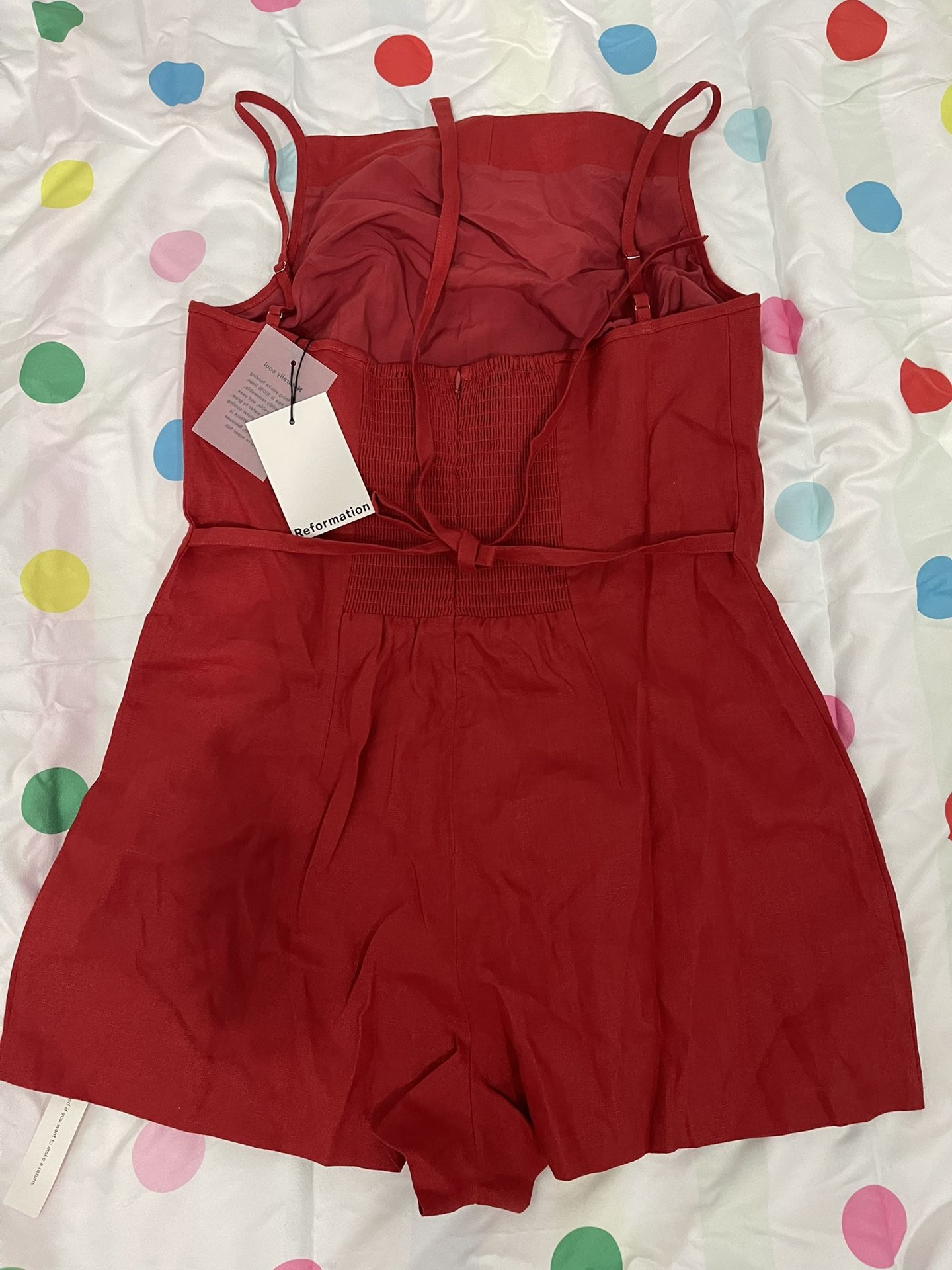 Beautiful red yarn jumpsuit from the Reformation brand, size M