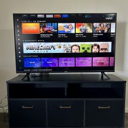 50” Vizio Smart TV with a TV stand (Valued at $330)