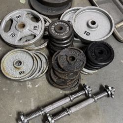 145 Pounds Of Standard Weights With Dumbbell Handles And Tricep Barbell