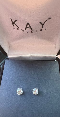 1 carrot diamond earrings was lifetime warranty