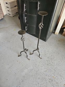 Two metal candle holders