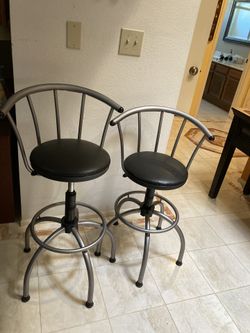 Metal Adjustable Swivel Stools.  Seat Height 24-28”.