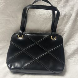 Black multi pocketed medium size handbag purse