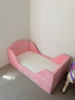 Like new Newton toddler mattress with bedframe