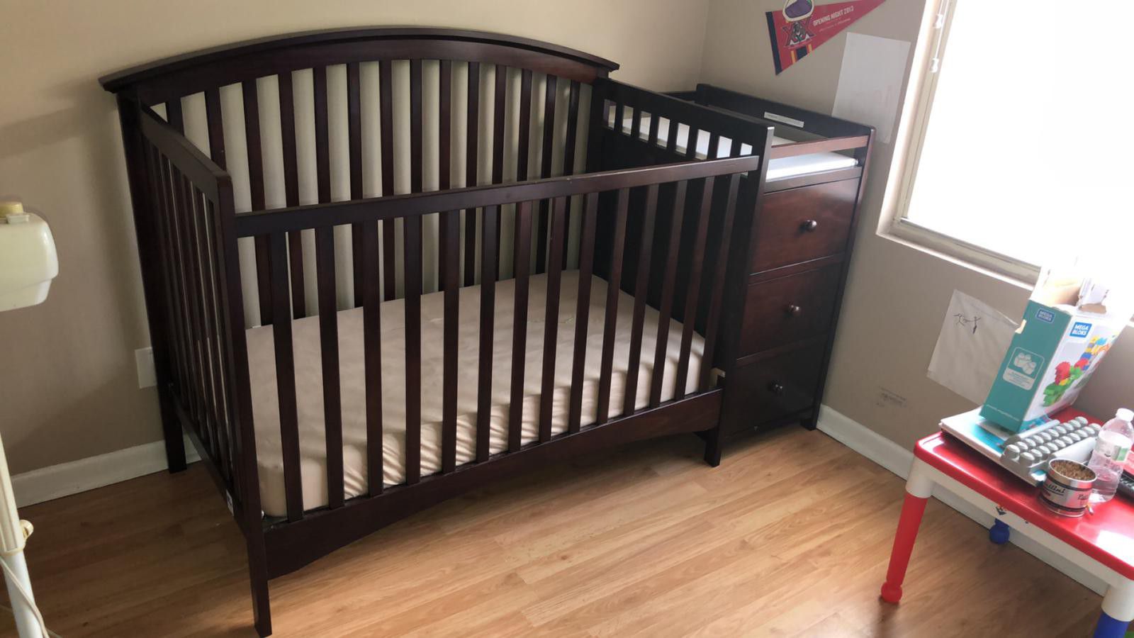 Baby crib with dresser and changing table mattress included.