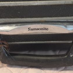 vintage Samsonite hard-shell luggage piece, from the 1960s or 1970s