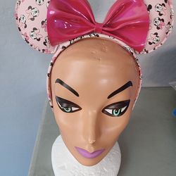 Pink Minnie Mouse Ears Pink ears with Minnie faces all over & a super shiny Bow