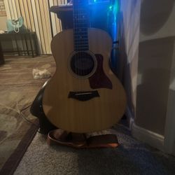 Taylor Acoustic Electric Guitar With Soft Case and cool strap