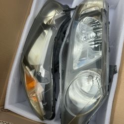 OEM 2006-2011 Civic 4D Headlights